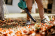 © aboutmomentsimages - Professional gardener doing landscaping chores, close up of garden works