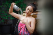 asian girl wearing sarong floral print shower