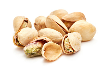 Wall Mural - heap of pistachios isolated on white background