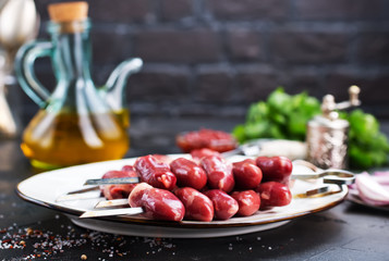 Canvas Print - raw chicken hearts