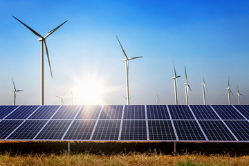 Wall Mural - solar panel with turbine and sunlight blue sky background. concept clean power energy