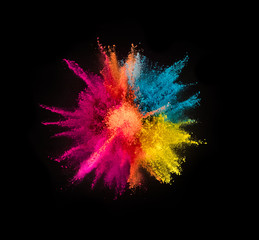 Wall Mural - Colored powder explosion on black background