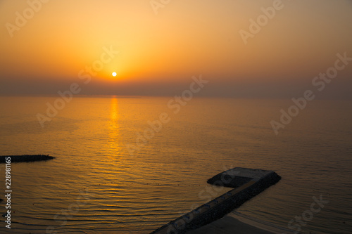 Fotografie, Obraz Panoramic view of sunset and helipad (landing area or platform for helicopters) in the Indian ocean