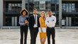 © Jacob Lund - Diverse group of business professionals standing outdoors