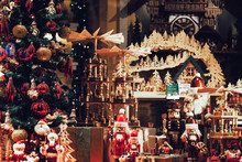 Variety Of Beautiful And Joyous Christmas And New Year Toys In The Nuremberg's Shop Window During Holiday Season