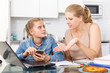 © JackF - Mother scolds her daughter for playing  smartphone