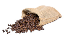 Roasted Coffee Beans Falling Out Of A Burlap Sack. Sackcloth Bag With Coffee Beans, Isolated On White Background.