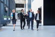 © alotofpeople - Business team walking together