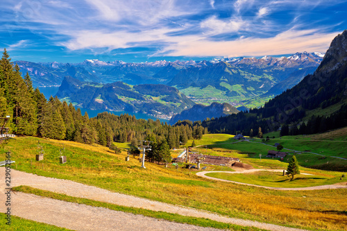 Fotomural Hillside landscape under Pilatus mountain with Lucerne lake aerial view