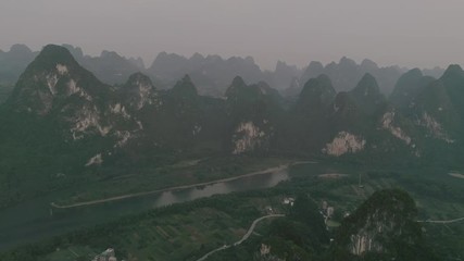 Wall Mural - Li River and Karst mountains. Located near The Ancient Town of Xingping, Yangshuo County, Guilin City, Guangxi Province, China.