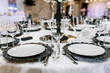 Wedding elegant table setting. Black & white color palette catering party