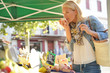 © goodluz - Middle-aged woman at the green market