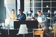 © Alex from the Rock - Startup and millenial business concept. Team works together in big open space office