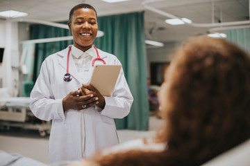 Wall Mural - Doctor telling a patient positive medical results