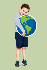 Wall Mural - Happy boy hugging an earth icon