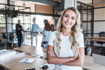 portrait of smiling woman in office