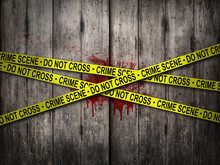 Crime Scene Do Not Cross Tape With Bloody Wall Background. Horror Theme