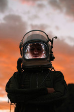 Girl Wearing Old Space Helmet At Sunset