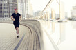 © opolja - Fit athlete running outdoors to stay healthy