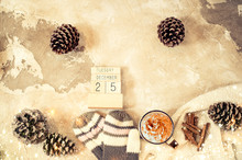 Christmas Concept Flat Lay With Winter Warm Clothes, Christmas Decorations And Coffee Drink On Vintage Background