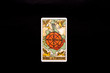 Leinwandbild Motiv An individual major arcana tarot card isolated on black background. Wheel of fortune.