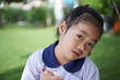 © sbo.ow-j - Portrait of a little girl in park  with student uniform.