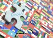 Puzzle with flags of the world and a piece representing union and peace.