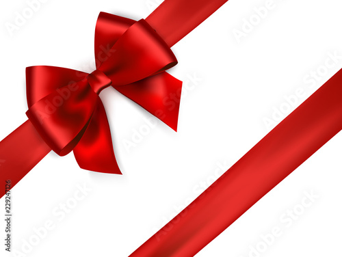 Fotomural Shiny red satin ribbon on white background.
