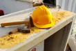 Worker Helmet and Hammers (Construction Helmet for Builder). Engineering Helmet and Hammers (Engineer helmet). Construction Site, Сoncrete Slabs, Сement, Сoncrete, Sand