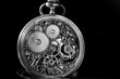 © Valerii - Skeleton Mechanism Vintage Pocket Watch. winter time and summer time concept, selective focus.