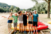 Group Of Young People On Kayak Outing