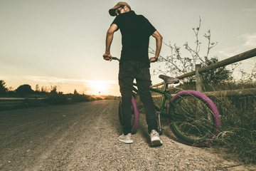 Wall Mural - Young man with his bmx bike