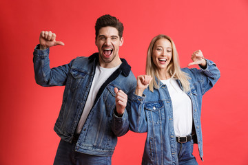 Sticker - Portrait of a happy young couple dressed in denim