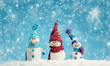 © candy1812 - little knitted snowmans on soft snow on blue background