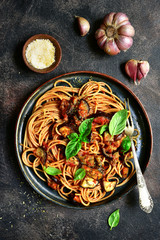 Canvas Print - Spaghetti alla norma - traditional italian pasta with eggplants and tomato. Top view.