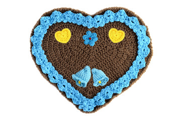 Wall Mural - blue crochet gingerbread hearts for valentines day with floral ornaments and heart shapes.