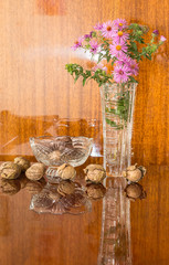 Wall Mural - walnuts in a crystal vase and flowers