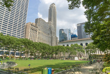 Green Lawn And Skyscrapers In Bryant Park In Midtown Manhattan, New York, USA
