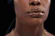 © LIGHTFIELD STUDIOS - cropped shot of african american woman with sparkling lip gloss isolated on black