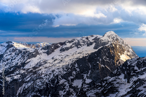 Winter Alpine Mountain Landscape Of Kamnik Savinja Alps Slovenia Sunset Or Sunrise In High Mountains With Rocky Peaks And Summits Kalska Gora Near Kamnik High Alpine Peak In Sunset Light Buy This