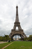 Fototapeta Boho - Beautiful view of the Eiffel Tower in the city of Paris on cloudy day.