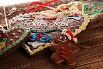 Wall Mural - original bavarian christmas gingerbread heart on wood. xmas gingerbread cookie.