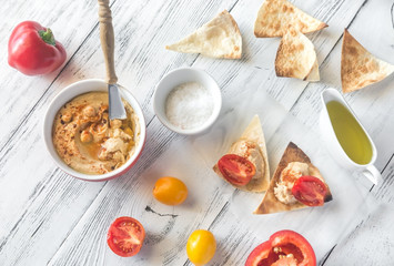 Poster - Bowl of hummus with and tortilla chips