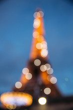 Bokeh Of Eiffel Tower In Romantic City At Night