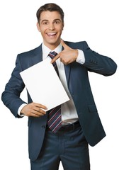 Poster - Businessman Holding Blank Sheet of Paper and Shows on it with