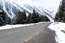 Highway Through Mountain With Snow At Winter