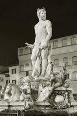 Fototapete - The famous fountain of Neptune on Piazza della Signoria in Florence, Italy