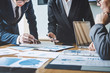 © Freedomz - Business team meeting present, investor colleagues consultation and conference new strategy plan business and market growth on financial document graph report, Meeting and Talking