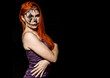 © sandyche - beautiful dead bride with terrible mask painted on her face. Halloween and creative make-up.