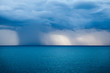 Dark and Dramatic blue sky and  blue sea color and dark storm raining cloud background